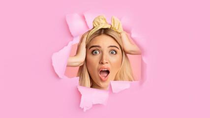 Shocked surprised amazed millennial european blonde female with open mouth shouts