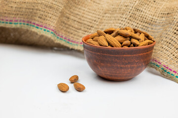 delicious brown almonds in a plate