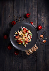 Caesar salad with shrimp photo for the menu on a solid background