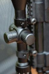 Close-up parts of automatic weapon with selective focus and blurred background