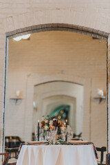 elopement dinner wedding table for two with flowers and decorations 