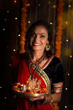 Indian woman with pooja thali 