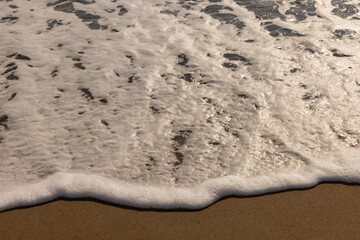 beautiful sandy beach and sea waves