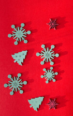 retro christmas wooden decorations on paper - photographed with descriptive, raking or low light