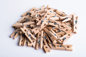 wooden clothespins on white background