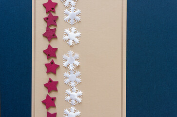 paper background with christmas elements (stars and snowflakes)