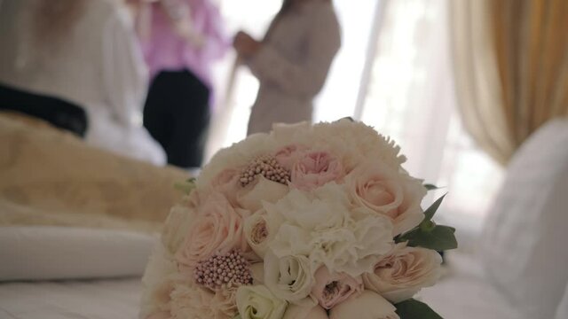 wedding bouquet close-up camera moves forward
