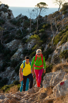 A group of friends hiking on the mountain, Calpe, Alicante, Spain