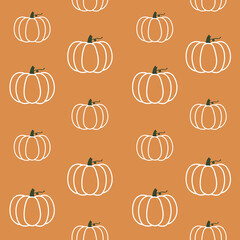 Pumpkin seamless pattern on brown background