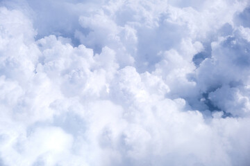 Blue sky with white clouds in sunny weather. Fluffy sky cloudy view atmosphere