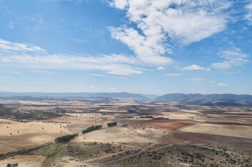 Open view of a valley with blue skies