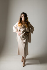 A model with a beautiful makeup in the studio on a white background. professional shooting and lighting in the studio