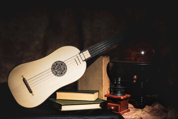 Fototapeta premium Musical still life in the Renaissance style with renaissance guitar