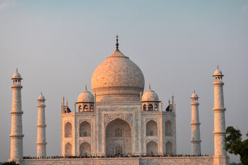 Fototapeta premium Taj Mahal, Agra, India, 7 world wonders. The magnificent view of Taj Mahal during sunset in the early evening.