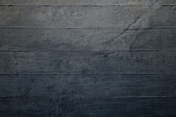 Concrete background with rough formwork marks. Abstract patterned concrete wall backdrop.