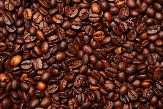 Roasted coffee beans texture background flat lay