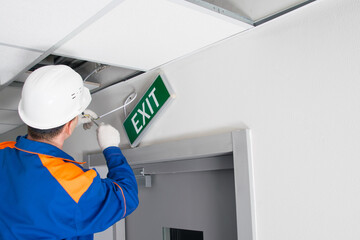 master of emergency evacuation exits maintenance, repairs the warning system