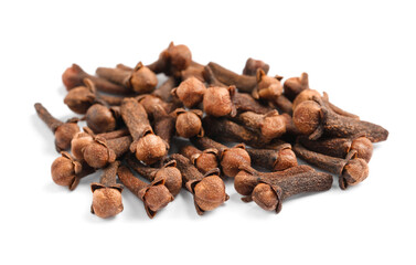 Pile of aromatic dry cloves on white background