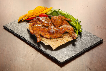 Roasted chicken served various vegetables