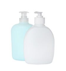 Dispensers of liquid soap on white background