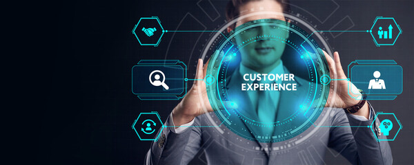 Business, Technology, Internet and network concept. Technology future. Young businessman clicks on the virtual display button: Customer Experience.
