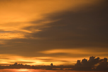 Fototapeta premium Tropical sunset. Part of a series of sunset and early morning cloud scenes. ideal for backgrounds and cloud replacement. many more coming. Something 