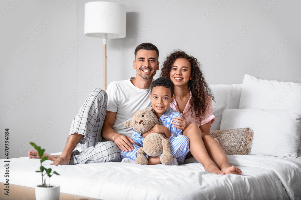 Sticker Happy interracial family in bedroom