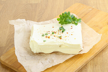 Greek Feta cheese over board
