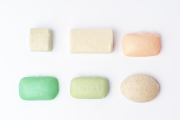 Top view of soap bars flat lay on white background