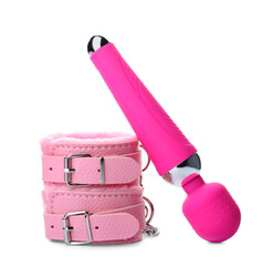 Handcuffs and vibrator from sex shop isolated on white