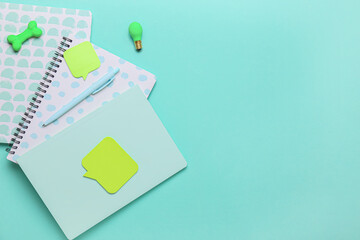 Set of stationery and sticky notes on color background