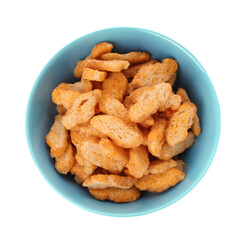 Delicious crispy rusks in bowl on white background, top view