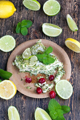 green cake with cream and lime