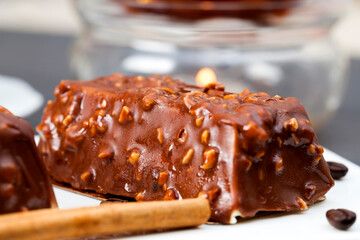 cake with peanuts poured with chocolate c