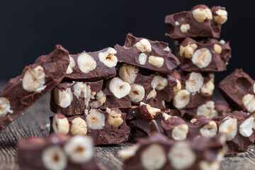 milk chocolate with whole and chunks of hazelnuts