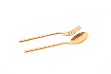 luxury golden stainless steel spoon and fork on white background