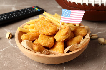 Concept of Super bowl snacks on textured background