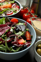 Concept of tasty food with vegetable salad with tahini sauce close up