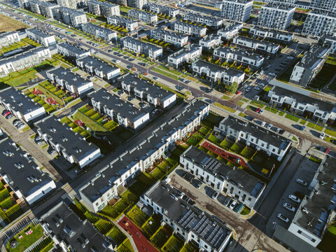 Drone view of urban scene in modern sims like city. 