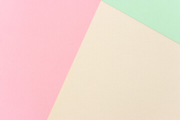 Pastel paper background with geometric stripes