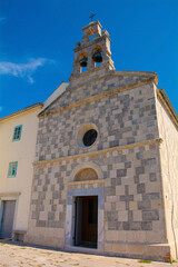 Fototapeta premium The 16th century church at Glavotok on the coast of Krk Island in Primorje-Gorski Kotar County, western Croatia 
