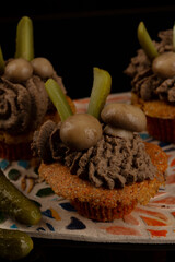 Meat liver muffins presented as funny creatures with mushroom eyes