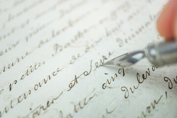 Old fashion writing sample with different writing techniques, papers, styles and calligraphy nibs.