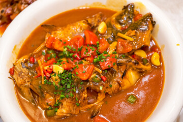 A delicious specialty of Guilin, Guangxi, China, braised tomato and beer fish