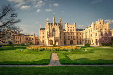 Ornamental flowerbed with blooming tulips in front of the castle in Lednice, Czechia