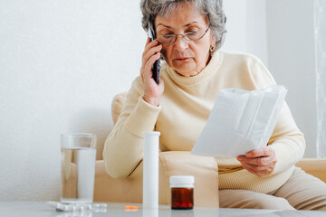Mature sick woman patient consultation with doctor by phone, prescription for dosage of treatment...