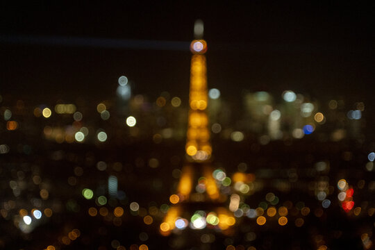 Eiffel Tower night blur movement light effect in camera