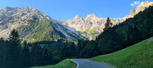 Naklejka na ściany i meble Alpine road in the morning, Austrian Alps