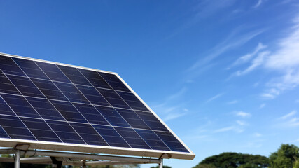 Mini solarcell panel on metal poles with bluesky background, concept for using natural power in...