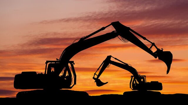 Excavator in construction site on sunset sky background. Timelapse.